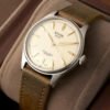 KUOE Royal Smith 90-006 Silver Case Ivory Dial Automatic Watch vintage green strap shot