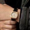 KUOE ROYAL SMITH 90-008 Automatic – Gold Case & Gold Indices black leather strap on wrist
