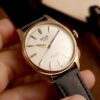 ROYAL SMITH 90-006 Gold Case Ivory Waffle Dial automatic watch black strap on hand