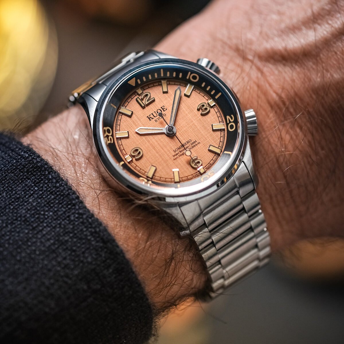 KUOE SOMBRERO 90-011 Salmon Pink linen textured dial Miyota 9039 20 BAR on wrist